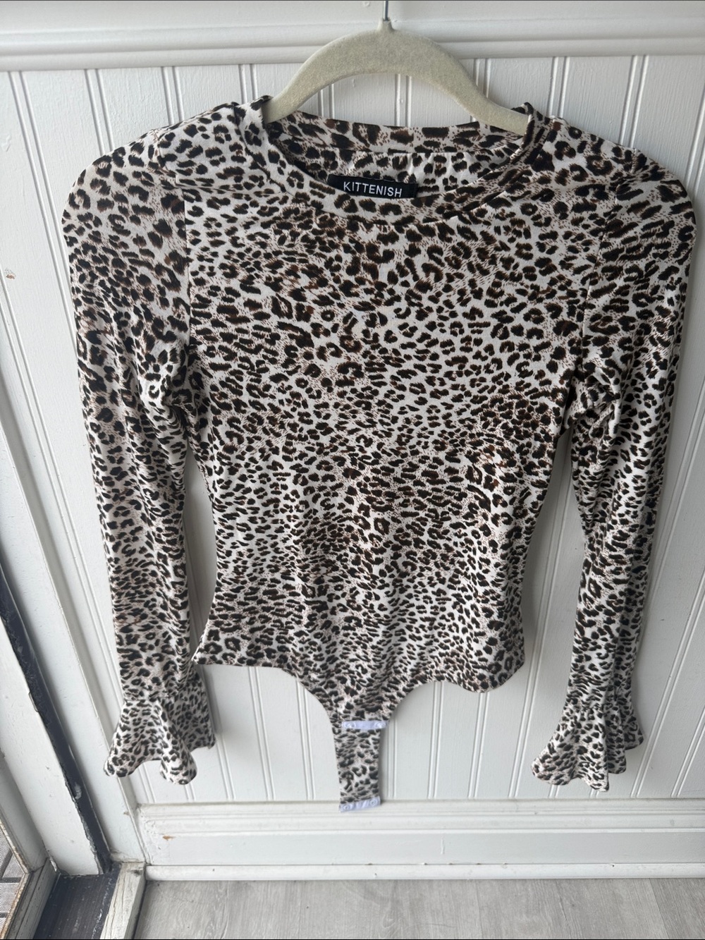 Kittenish Leopard-Print Long Sleeve Bodysuit in Brown and Black